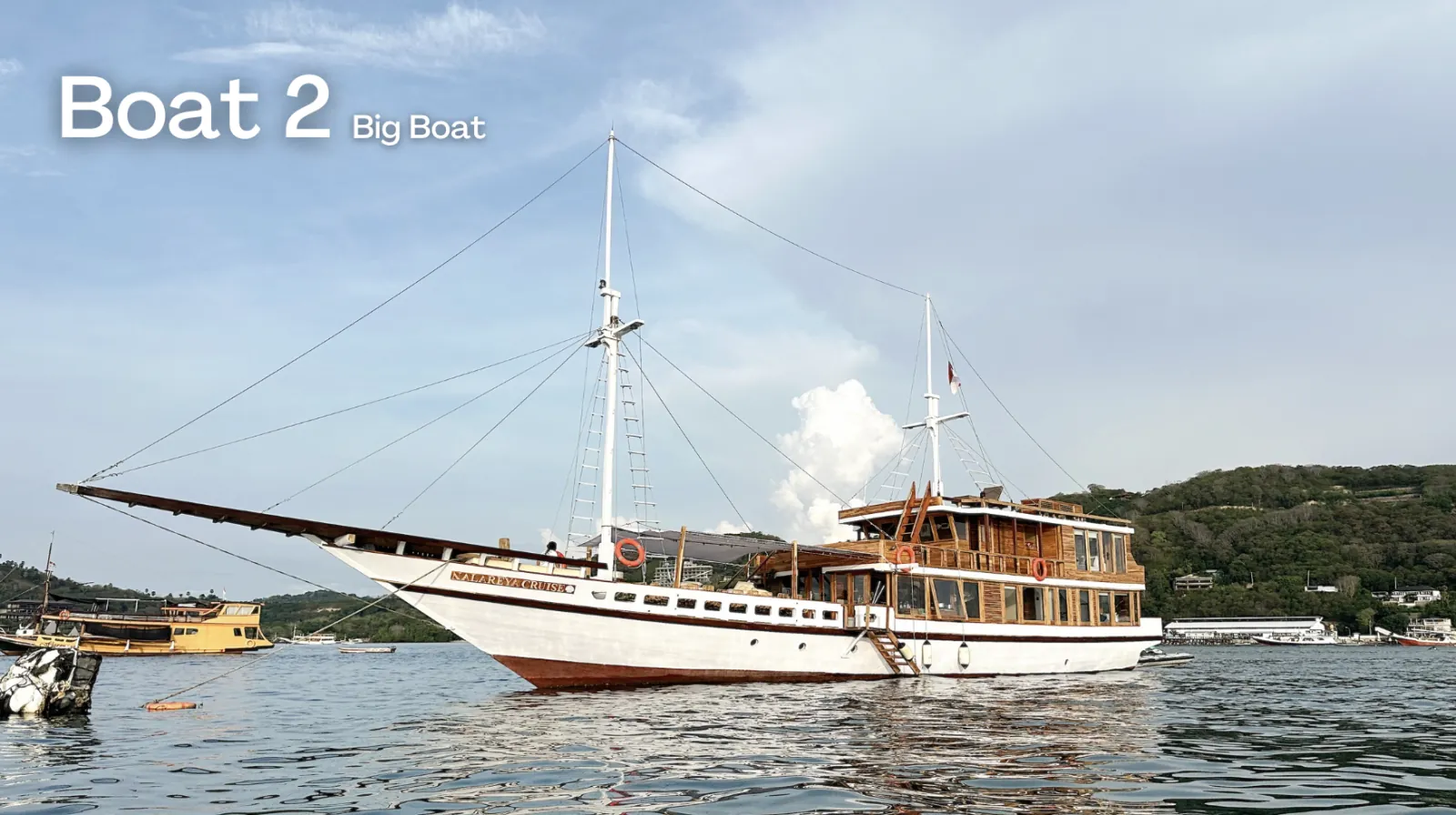 The Phinisi liveaboard at anchor off a Komodo National Park island