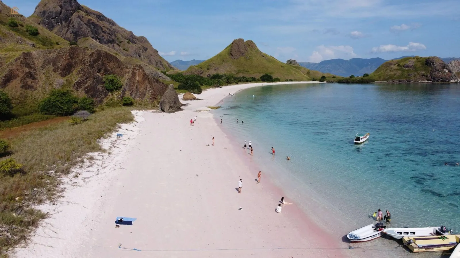 Pink Beach seen from above with a tender moored offshore, Komodo National Park