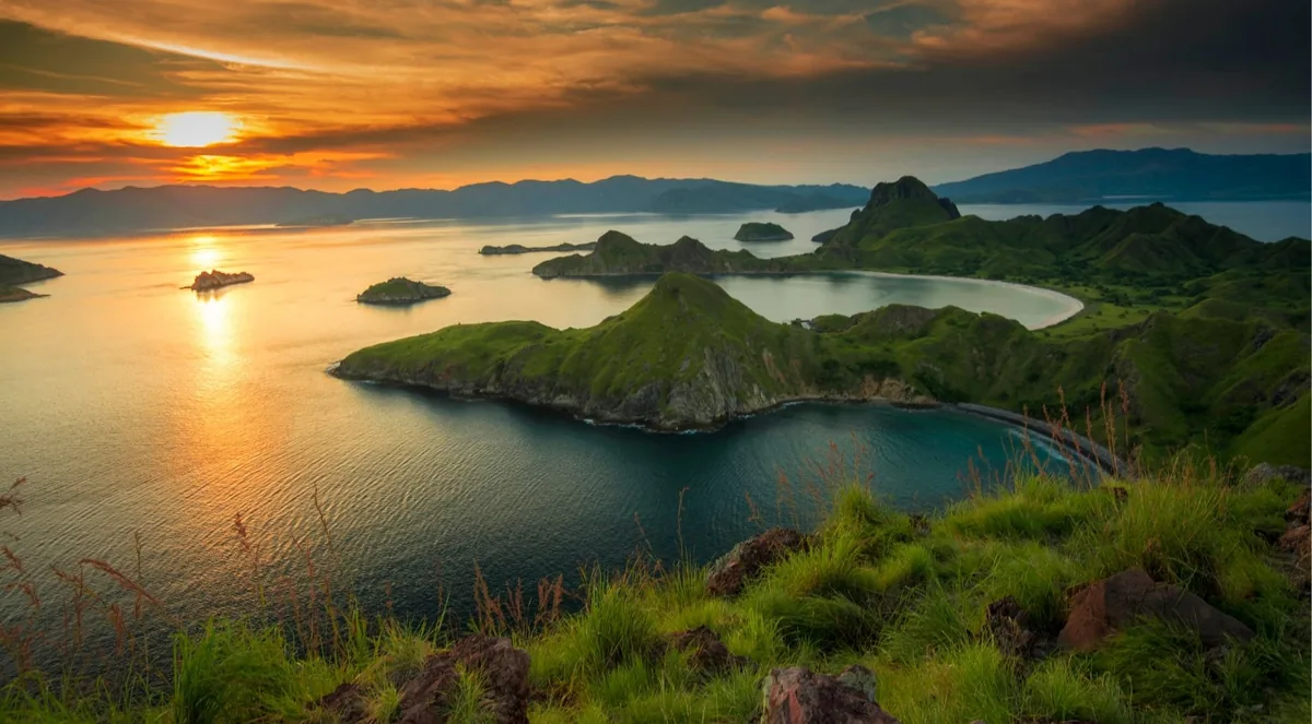Sunset over the islands and bays of the Komodo archipelago